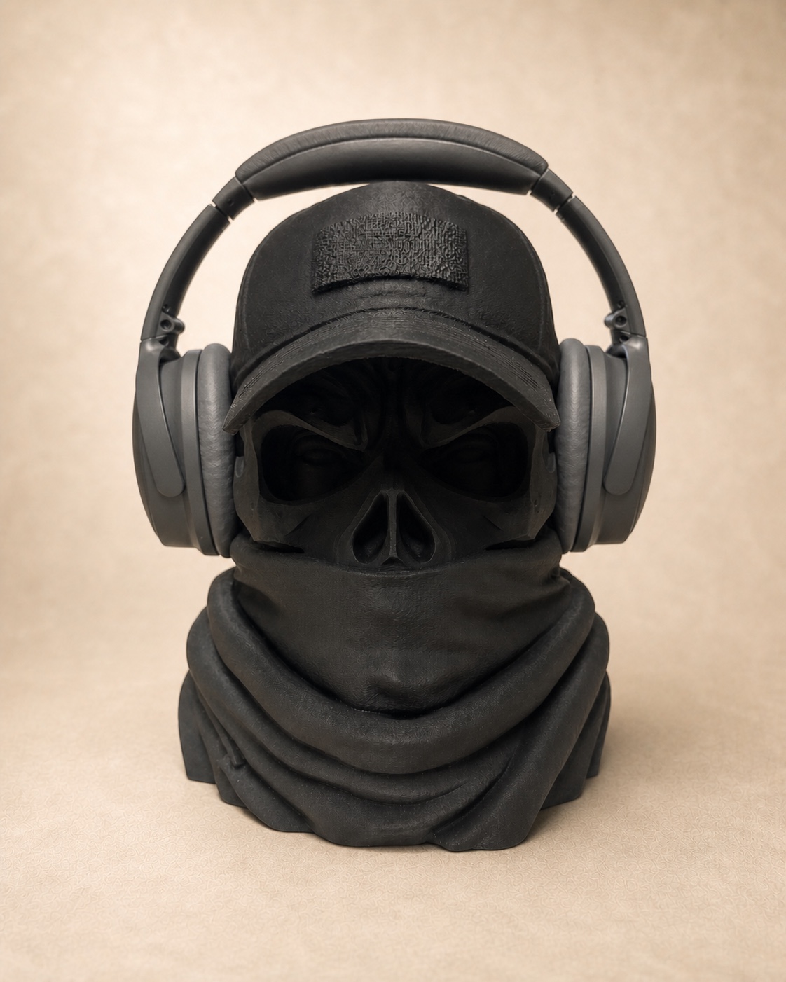 Black tactical skull headphone stand with cap and neck gaiter